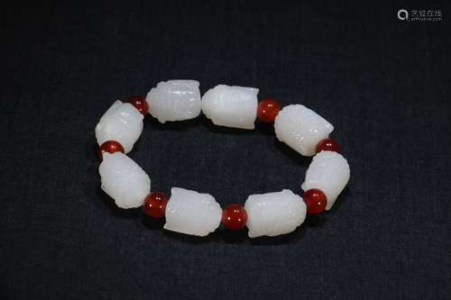 A Chinese Hetian Jade Bracelet With Gautama Buddha