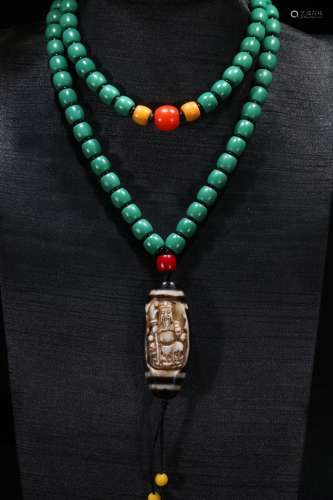 A Dzi Necklace With Sherpa Glass Bead