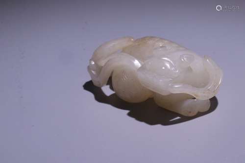 A Chinese Hetian Jade Pendant With Beast Carving