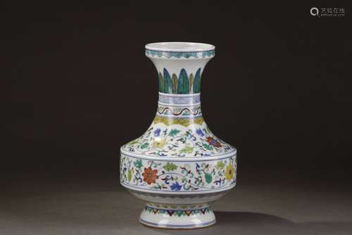 A Chinese Porcelain Vase With Flower Pattern