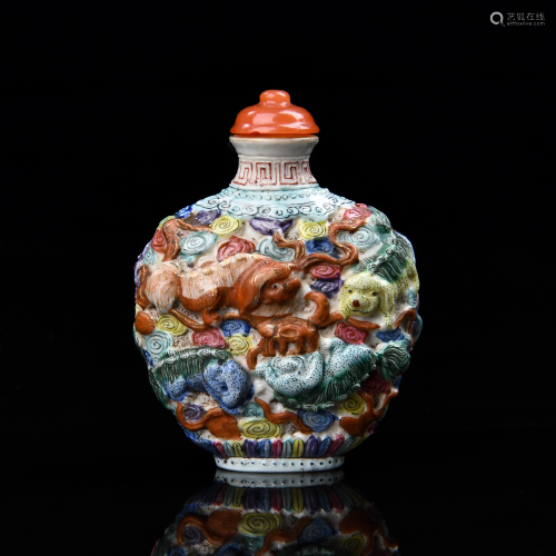 An Enameled and Molded Porcelain Snuff Bottle …