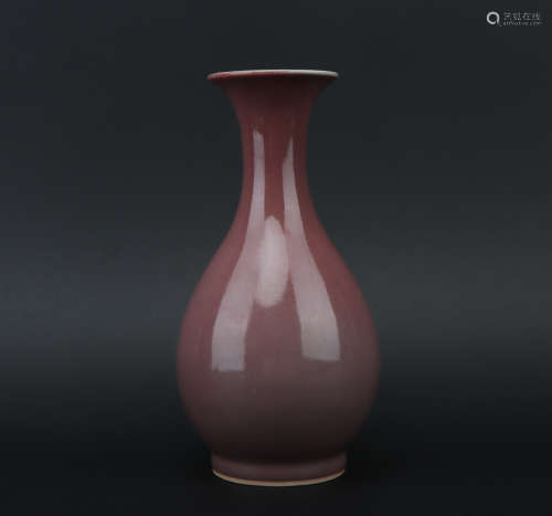 Qing dynasty cowpea red glaze bottle