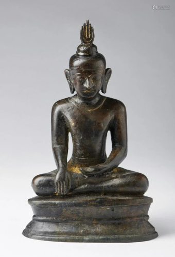 Arte Sud-Est Asiatico A dark bronze figure of seated