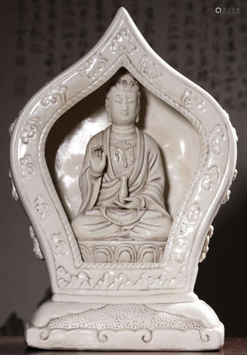 A WHITE GLAZE PAGODA WITH GUANYIN BUDDHA