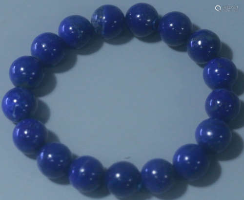 A LAZULI STRING BRACELET WITH 17 BEADS