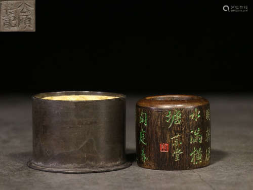 A CHENXIANG WOOD RING CARVED WITH POETRY