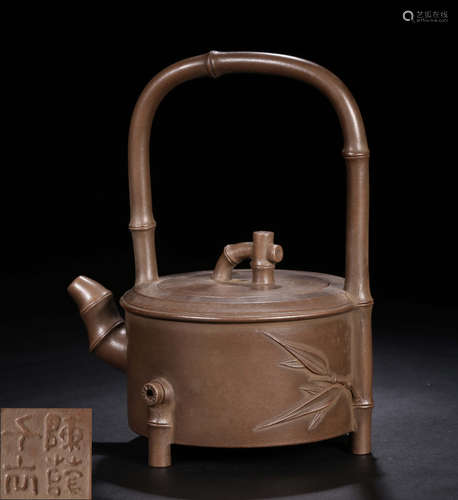 A ZISHA TEA POT CARVED WITH BAMBOO PATTERN