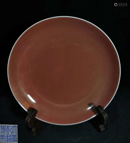 A RED GLAZE PLATE WITH MARK