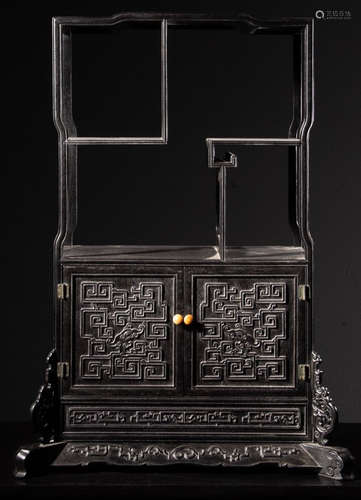 A ZITAN WOOD CABINET CARVED WITH PATTERN