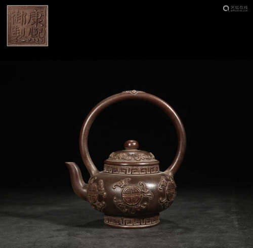 A ZISHA TEA POT CARVED WITH AUSPICIOUS PATTERN