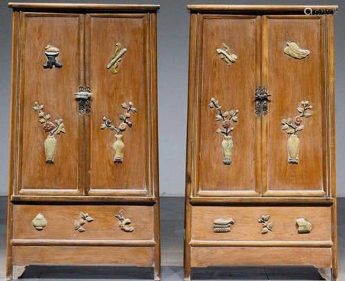 A HUALI WOOD CABINET EMBEDDED WITH EM