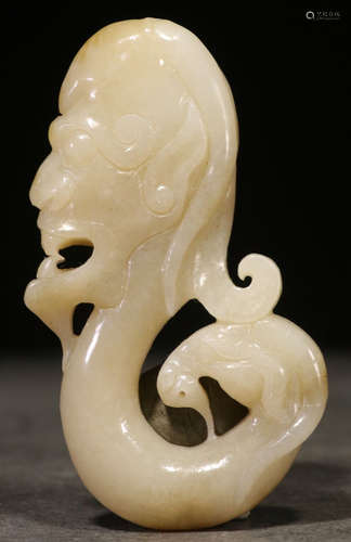 A HETIAN JADE BEAST PENDANT