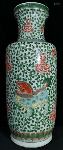 A GREEN GLAZE VASE PAINTED WITH LION