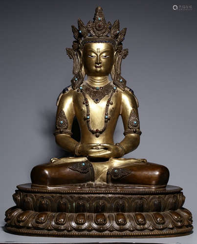 A GILT BRONZE LONGEVITY BUDDHA STATUE