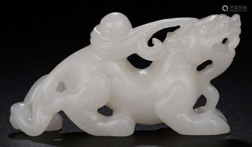 A HETIAN JADE BEAST PENDANT