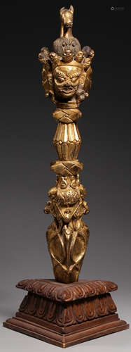 A GILT BRONZE VAJRA CARVED WITH BUDDHA