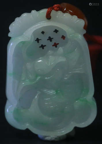 A JADEITE PENDANT CARVED WITH FISH