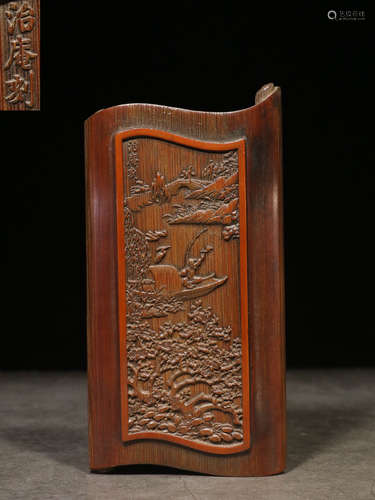 A BAMBOO ARM REST CARVED WITH STORY PATTERN