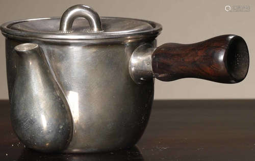 A SILVER POT WITH MARK