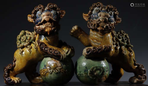 PAIR OF SHIWAN YAO BROWN GLAZE ORNAMENT SHAPED WITH LION