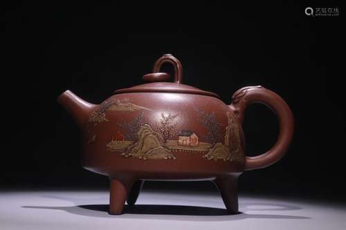 A Chinese Zisha Teapot With Landscape Pattern