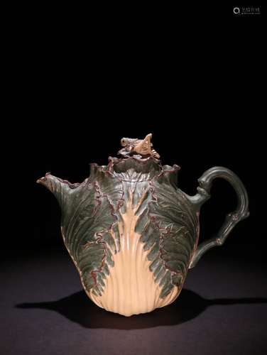 A Chinese Zisha Teapot Of Vage Shaped With Mark