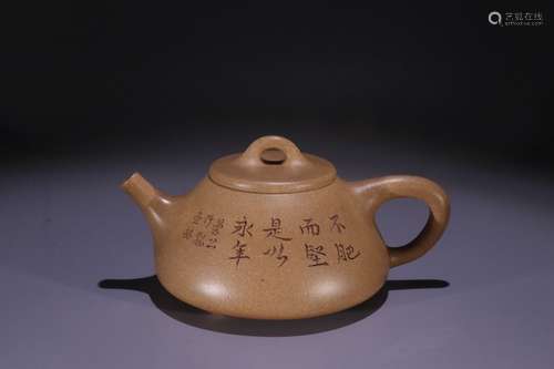 A Chinese Zisha Teapot With Poetry Carving