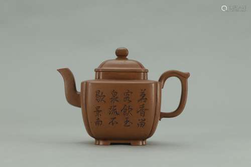 A Chinese Zisha Teapot With Poetry Carving