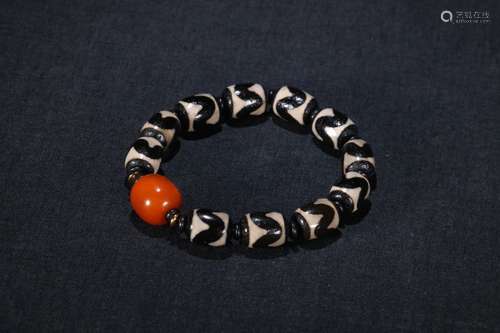 A Chinese Dzi Bracelet With Amber