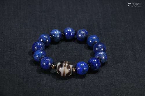 A Chinese Lapis Lazuli Bracelet With Dzi