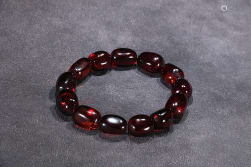 A Chinese Red Amber Bracelet