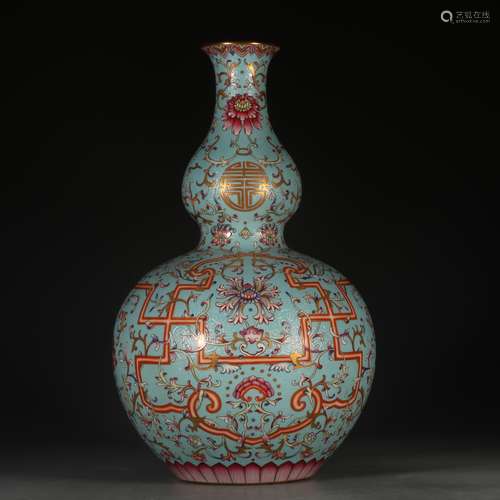 A Chinese Porcelain Famille Rose Gourd Vase With Floral Painting