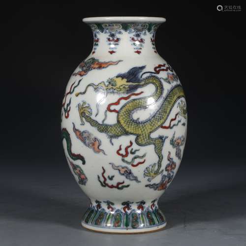 A Chinese Porcelain Doucai Vase Of Dragon Pattern