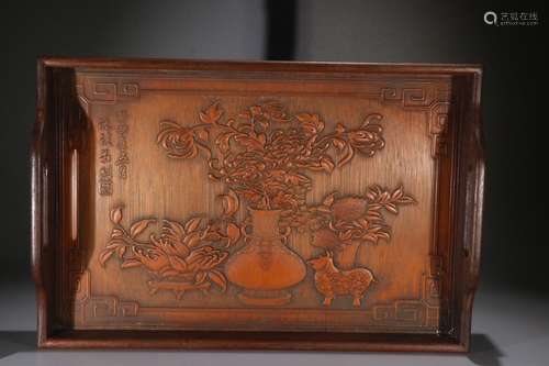 A Chinese Red Wood Tea-Saucer With Landscape Carving