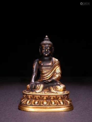 A Chinese Gilt Bronze Gautama Buddha Statue