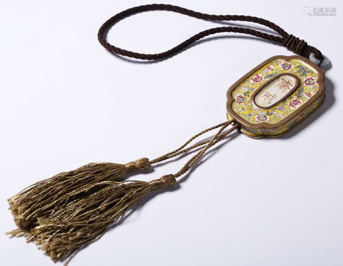 A COPPER TABLET PAINTED WITH FLOWER PATTERN