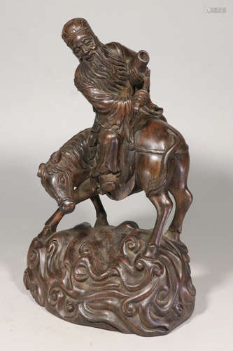 A CHENXIANG WOOD FIGURE STATUE