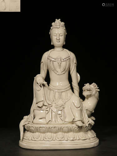 A WHITE GLAZE BUDDHA STATUE