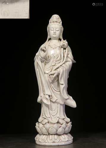 A WHITE GLAZE GUANYIN BUDDHA STATUE