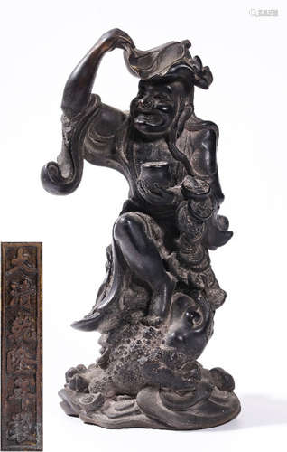 A COPPER FIGURE STATUE