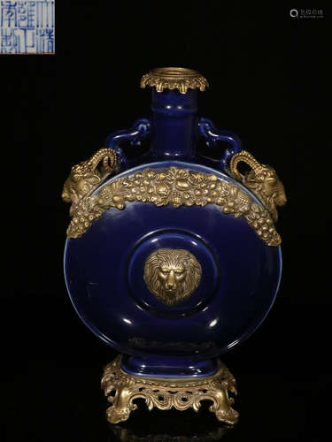 A BLUE GLAZE VASE WITH COOPER ERAS