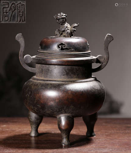 A COPPER CENSER WITH BEAST COVER