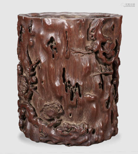 A BAMBOO BRUSH POT CARVED WITH FLOWER PATTERN