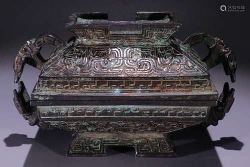 A COPPER CONTAINER CARVED WITH BEAST PATTERN