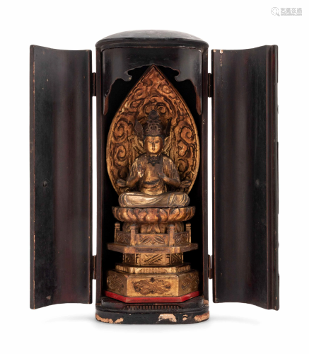 A Black Lacquered Shrine with a Gilt Wood Figur…