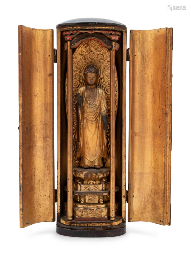 A Black and Gilt Lacquered Wood Shrine with …