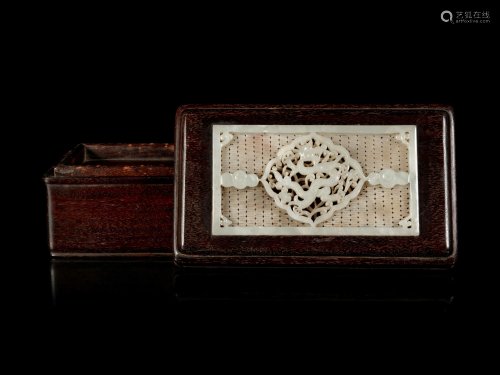 A Chinese White Jade Inset Zitan wood Covered Box