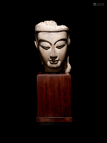 A Carved Stucco Head of Guanyin