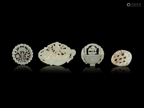 Four Chinese Jade Reticulated Pendants