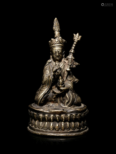 A Sino-Tibetan Silvered Metal Figure of Padmasambh…